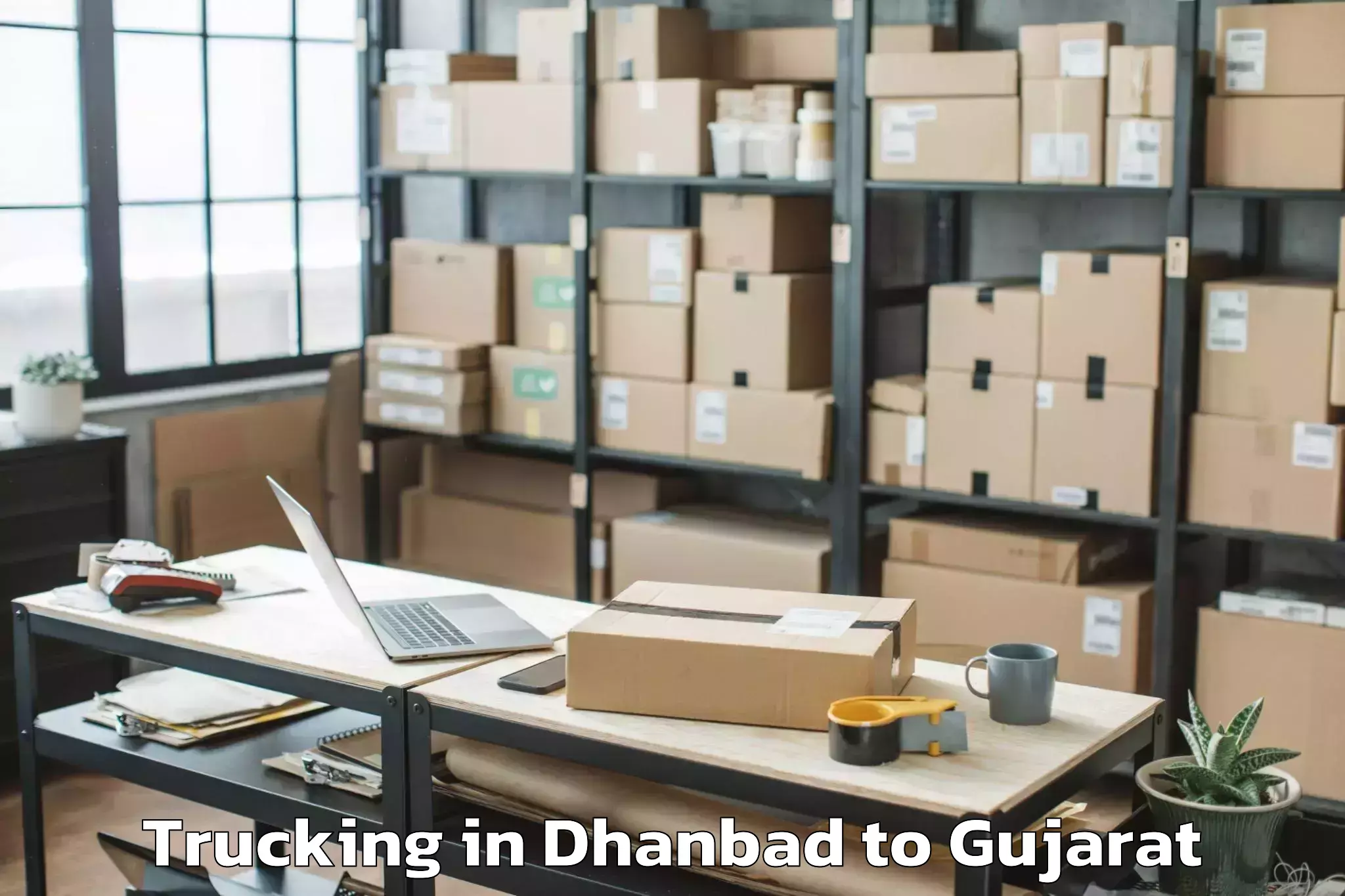 Book Dhanbad to Jamjodhpur Trucking Online